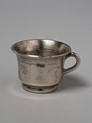 Miniature Dutch silver chamber pot on a stepped foot.jpg