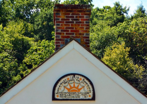 2022-08-14_Sunrise Mill Sign bears the initials of owners Jacob and Mary Shoemaker above the bay door from that era0001.JPG