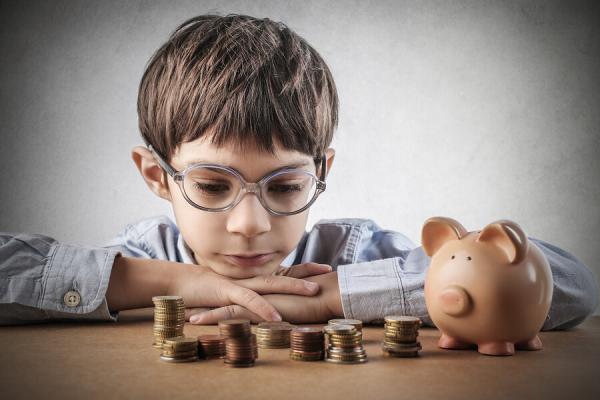 bigstock-Child-saving-money-85487978.jpg