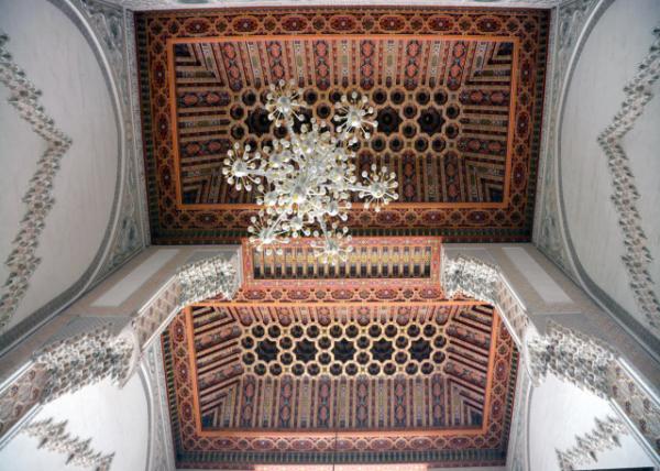 2024-06-06_31_Notable Architectural Features in the Columns_ Horseshoe Arches_ Snowflake-esque Chandelier_& the Innumerable Muqarnas Embellished the Ceilings0001.JPG