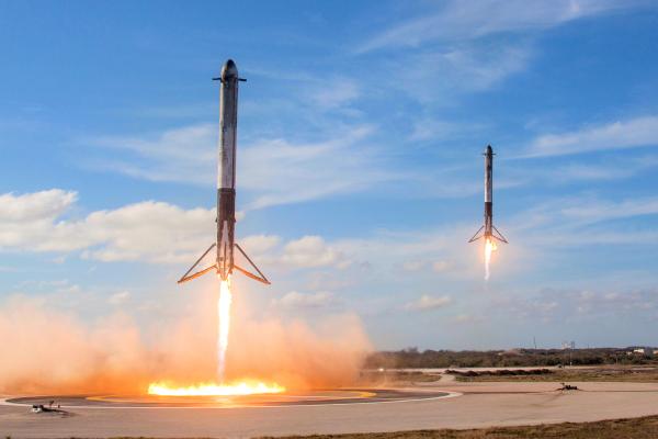 Falcon Heavy Side Boosters landing on LZ1 and LZ2 at Cape Canaveral.jpg