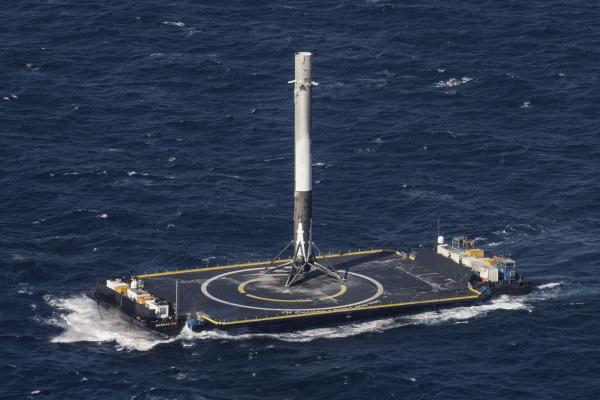 Falcon 9 first stage on an autonomous spaceport drone ship (ASDS) barge after the first successful landing at sea, SpaceX CRS-8 mission.jpg