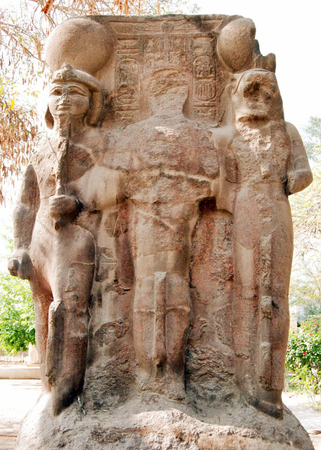 04-05-11_ Mit Rahina_Triad of Memphis (Ptah-Skhemet-Nefertum) in Pink Granite Stone from New Kingdom_ Memphis0001.JPG