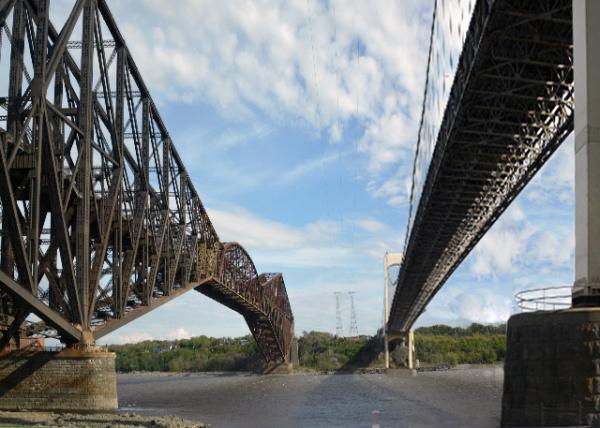 2017-05-29_Bridge_Quebec Bridge & Pierre Laporte Bridge (behind) a Road Bridge over the St. Lawrence River, Linking the cities of Quebec & Levis.jpg