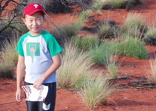 01-08-10_ Uluru, the Ayers Rock_Buffel Grass in Sandstone Desert.jpg