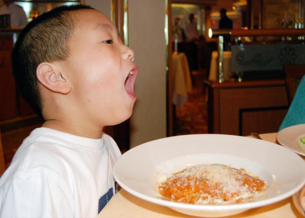 01-25-09_ Island Princess_Blowing on Hot Buffalo Mozzarella Pasta @ Lunch.jpg