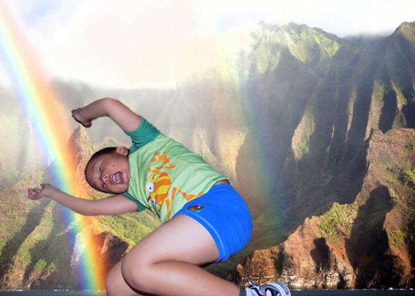 10-07-07_ A Double Rainbow Arcing above the Jagged Cliffs & Dense Vegetation of Kalalau-10001.jpg