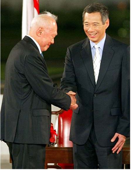 1762193415701662.jpg 李光耀父子.JPG