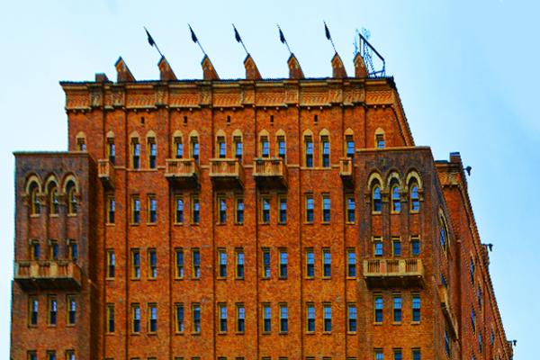 2022-04-13_Americus Hotel (1926-1927) w Buff-Colored Brick_ Curved Romanesque Arches & Romantic if Somewhat Superfluous Balconies to echo Coolidge-era America's passion for the exotic world of old Spain00.JPG