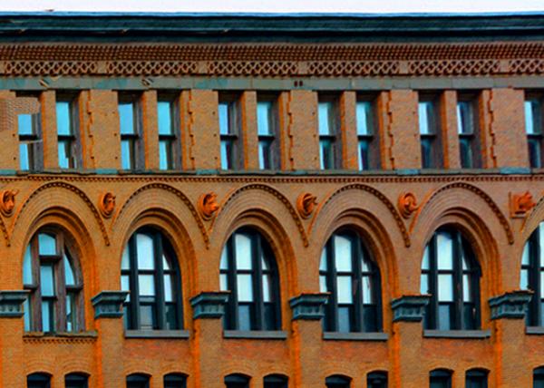 2022-04-13_Breinig & Bachman Bldg (1894)_Circular Terra Cotta Plaques Featuring the Heads of Various Farm Animals Built into the Brickwork of the Bldg between the 4th  and 5th Fl0001.JPG