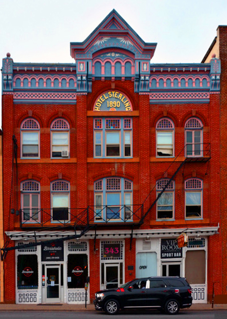 2022-04-13_Hotel Sterling (1890)_ Victorian Era Hotel built in the Romanesque Revival Style w Queen Anne and Eastlake Influences along 3 Bays Wide_ w a Gabled Parapet @ the Middle Bay0001.JPG