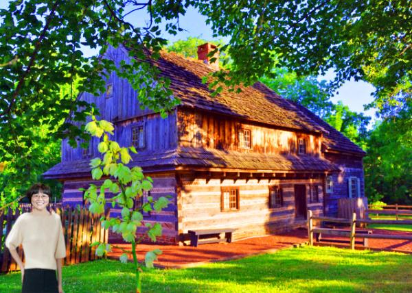 2022-07-03_Edward Morgan Log House_Chinked w Diagonally Placed Stones under a Pent Roof Running around 3 Sides_ & the Gable Ends Covered in the Vertical Sheathing-10001.jpg