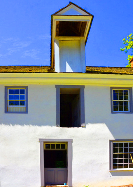 2022-08-14_Sunrise Mill_3 Doors under the Dormer Sack Lift w Detail of the Wooden Pinned Corner Juncture of the Window Frame0001.JPG