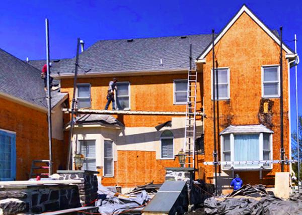 2022-04-15_06_Poorly built home due to defective and missing flashing details and other defects which permitted water to leak into the home and rot the wood substrate behind the stucco exterior.JPG