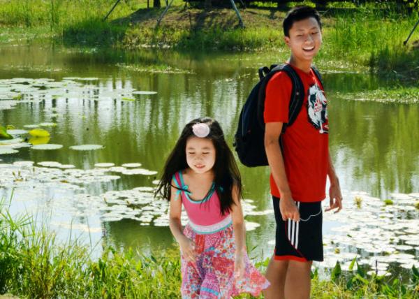 2018-08-24_2nd Grader w 9th-Grader Bro w Primus Place Cultural Park_Lotus Pond-20001.JPG