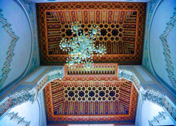 2024-06-06_31_Notable Architectural Features in the Columns_ Horseshoe Arches_ Snowflake-esque Chandelier_& the Innumerable Muqarnas Embellished the Ceilings0001.JPG