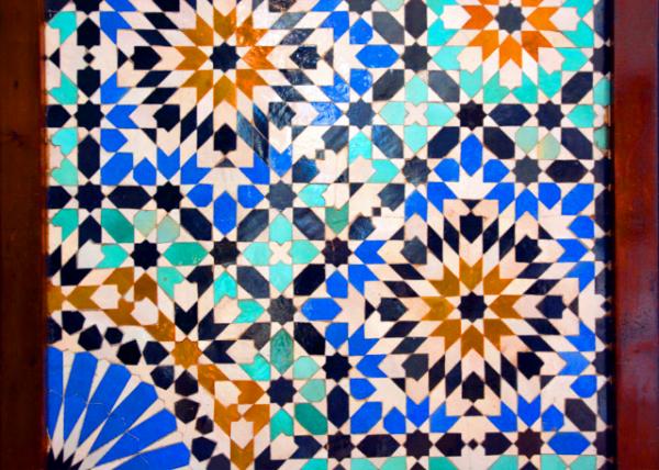 2024-06-06_A Wall Covered in Zell��j Made from Individually Hand-Chiseled Tile Pieces Typically of Different Colors & Fitted Together to Form Various Patte0001.JPG