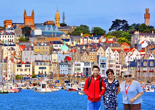 2016-07-08_St Peter Port_Elizabeth College @ L & Victoria Tower @ R Viewed from Caribbean Princess.jpg