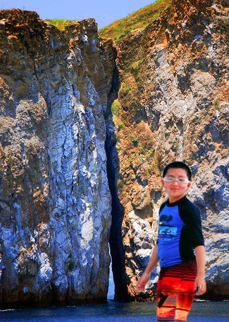 04-05-13_ Another Side of Kicker Rock, Remains of a Volcanic Tuff Cone, Split into 2 Towerin0001.JPG