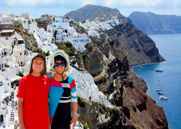 2015-06-19_Terraces of Whitewashed, Cliff-top Buildings in Fira.jpg