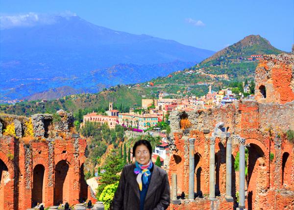 1996-01-10_Ruins of the Ancient Greek Theater in Taormina w the Etna volcano in the background.jpg